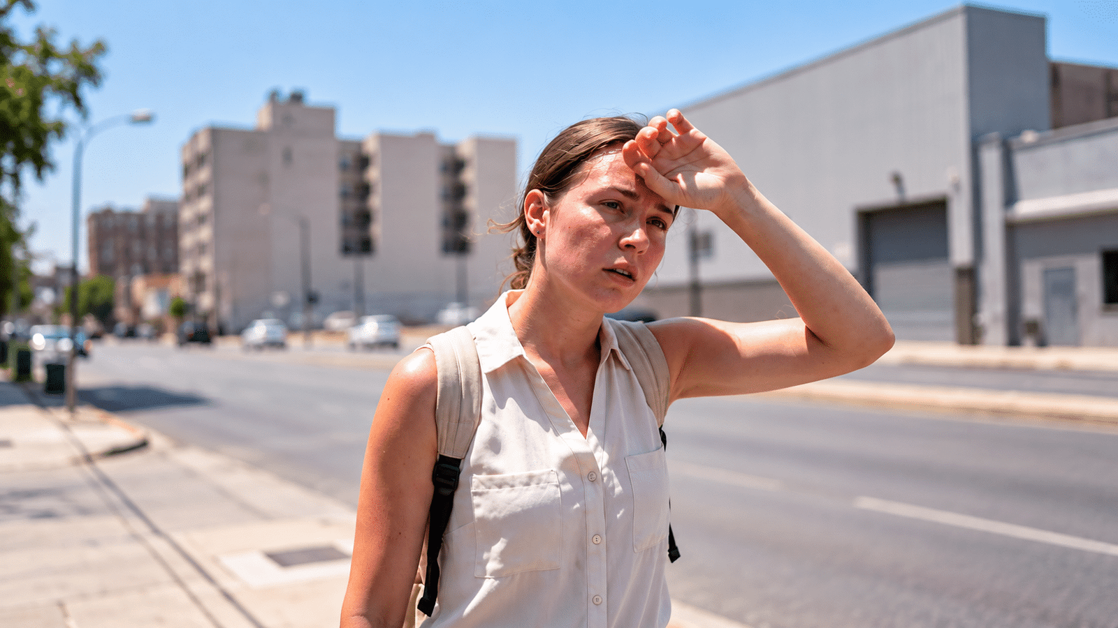 An active traveler sweating heavily due to the intense bali humidity